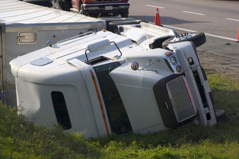 Commercial truck tipped over after a truck accident